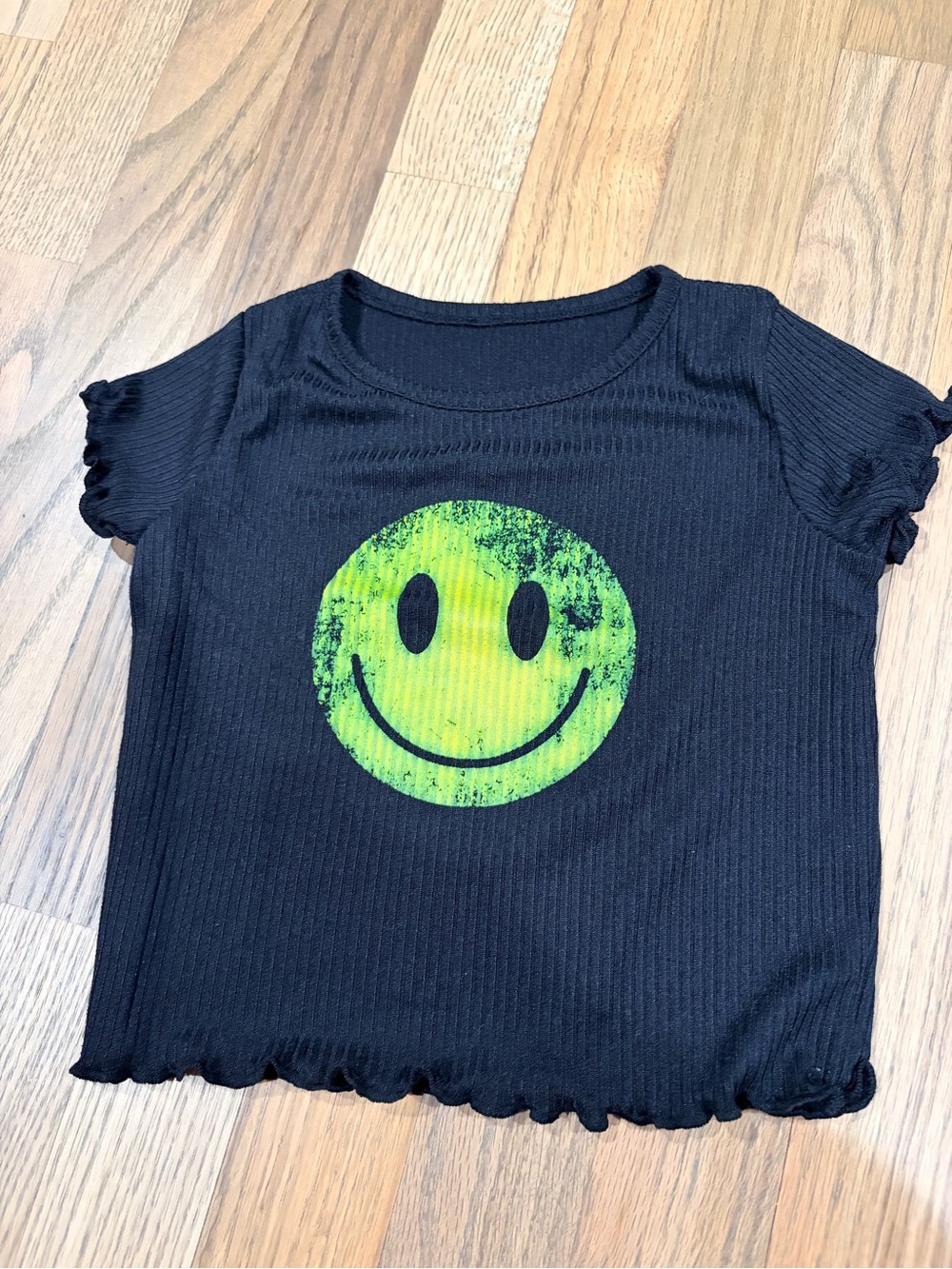 Denny’s toddler girl black ribbed tee with yellow smiley